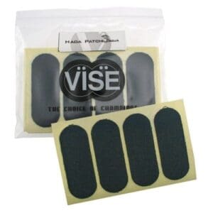Black oval adhesive patches in a clear resealable bag.